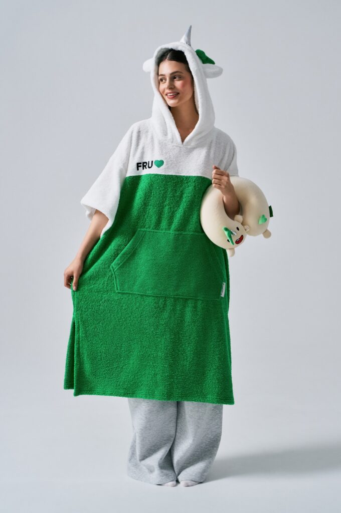 Green and white poncho towel with unicorn mascot for Fundraise Up holiday gifts for employees