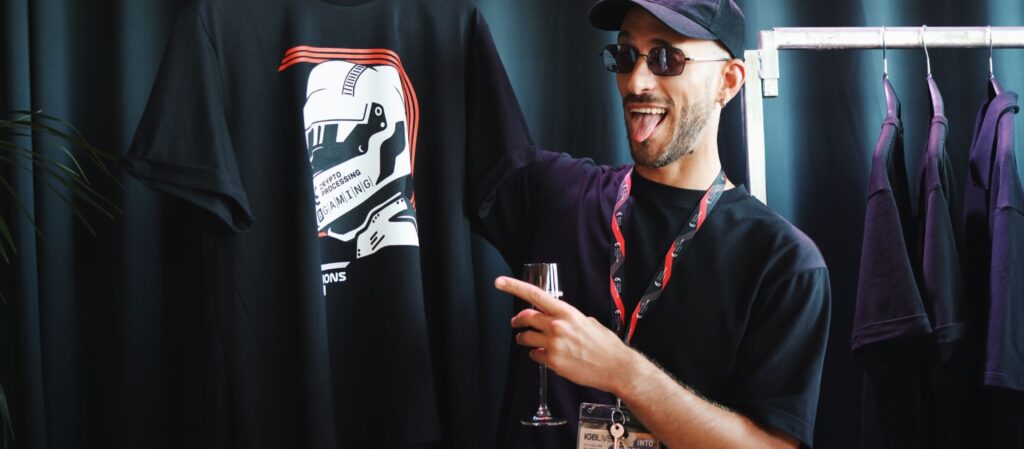 A person holding branded event merch
