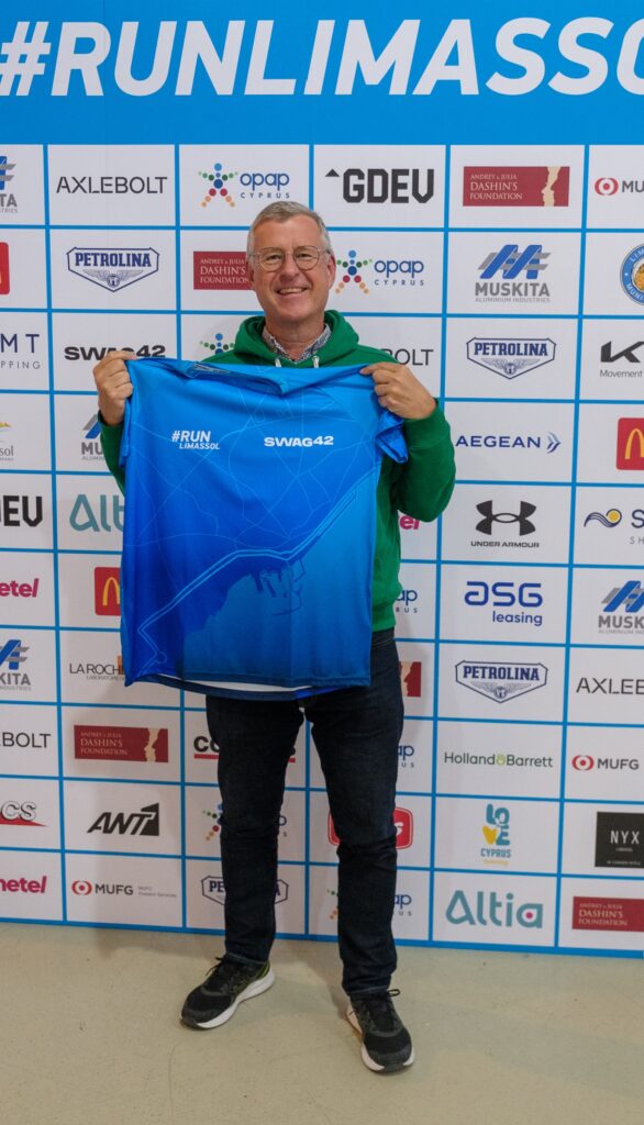 A person holding marathon gear