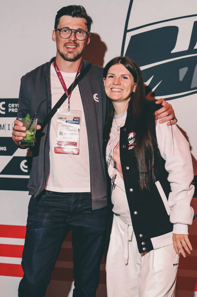 People in branded event merch