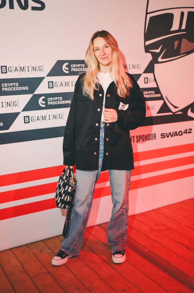 A person in branded event merch