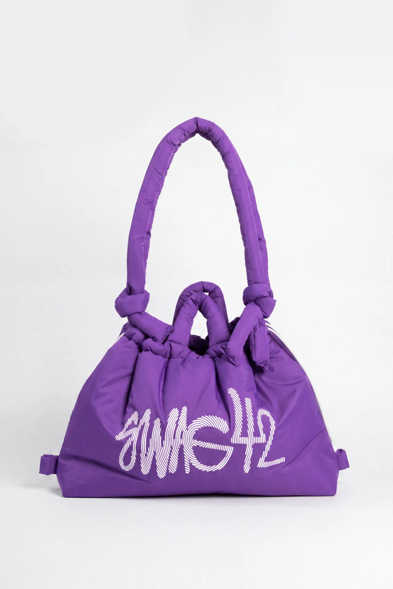Event merchandise: custom puff transformer tote bag